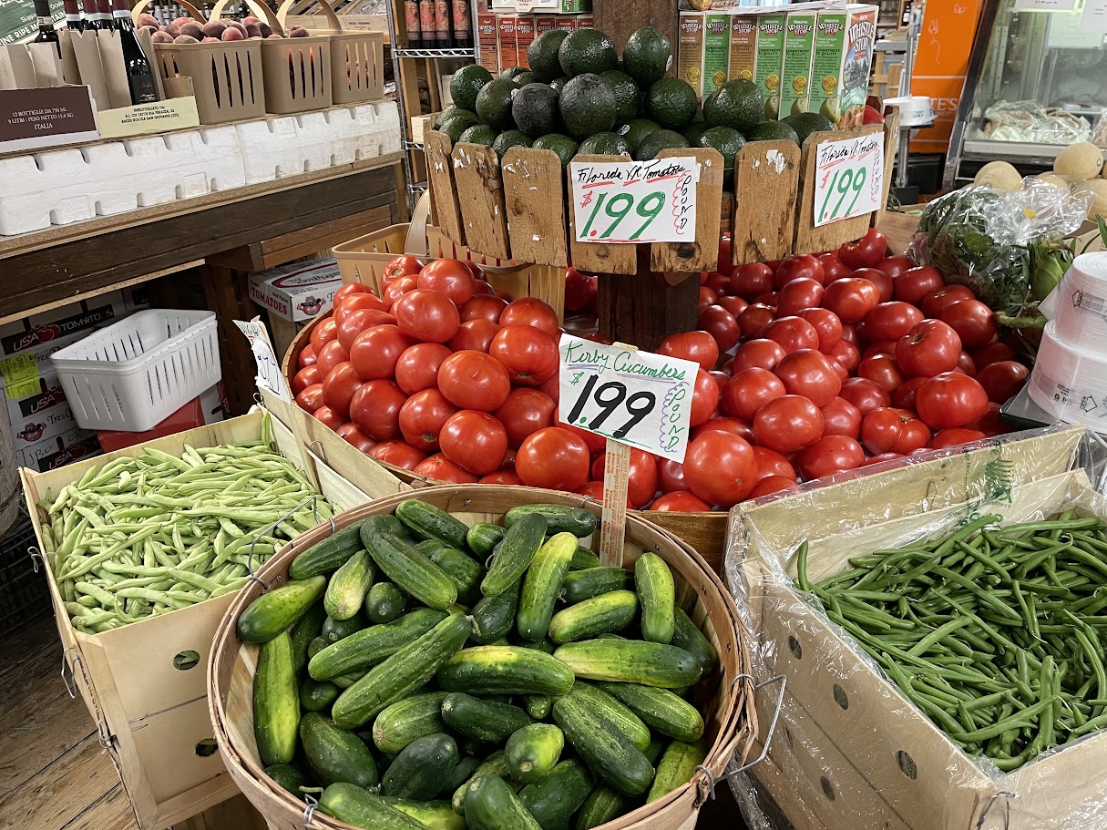 Fresh vegetables displayed in baskets at the market