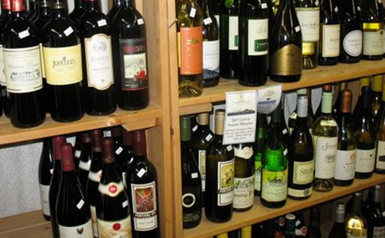 Wine bottles on the shelves at Lee's Farmers Market